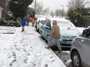 Picture 4 Dolphin Road in snow with people by Syed Bukhari