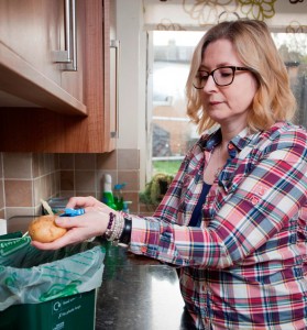Claire Duffy using the food waste bin