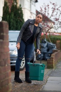 Leah puts out the green food waste bin