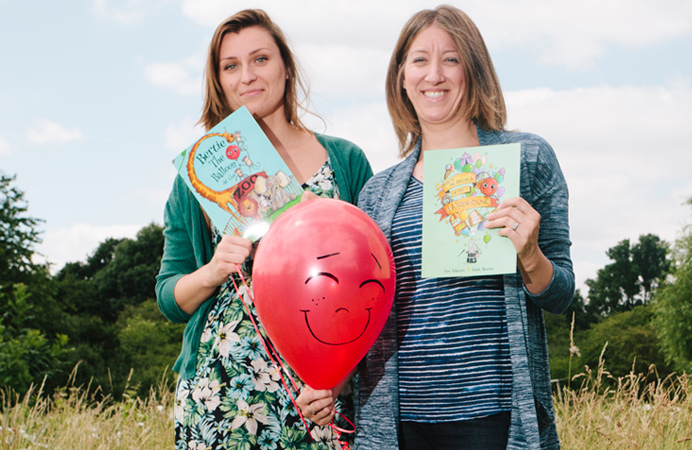 Illustrator Aneta Neuman and author Kim Robinson with Bertie the Balloon and books