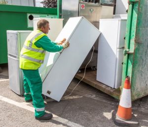 Refrigerators being loaded into a container at Greenford Road Re-use and Recycling centre