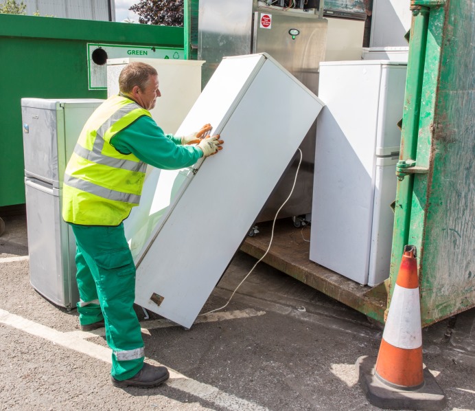 Refrigerators being loaded into a container at Greenford Road Re-use and Recycling centre