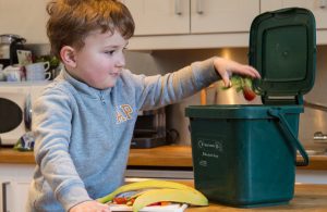 Boy in Ealing recycling food waste