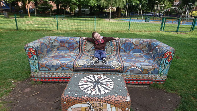 Harley on mosaic bench in South Acton Recreation Ground, by Jayson Hurwood