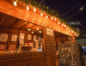 Christmas market in Ealing - go along to see the gifts and food on offer from the wooden cabins