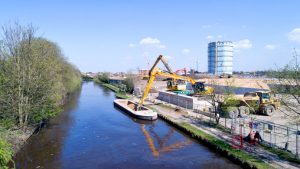 Deliveries by barge on Grand Union Canal, at Southall Waterside development