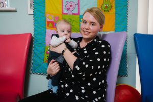 Amy Charlwood with baby Joseph at Grange Children's Centre