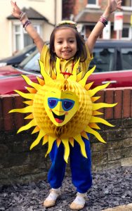Angella Baria-Gambling - child dressed as the sun for nursery summer concert Hanwell