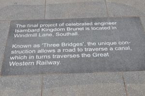 Historical detail on paving slab in St John's Church square, Southall