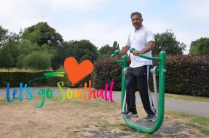 Janpal Basran in Southall Park using the oudoor gym equipment - Let's Go Southall programme is under way