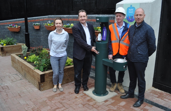 Council leader Julian Bell checks out new water fountain in Acton