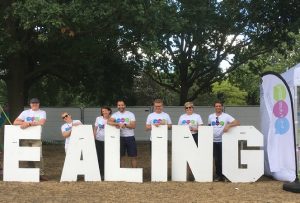 Ealing sign with council staff