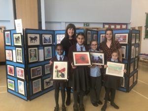 St John Fisher Catholic Primary School exhibition: Shirley Sexton, year 6 teacher and head of English and art; pupils from years 5, 6, 4, and 3; and Christina Urbanski, year 4 teacher and head of humanities.