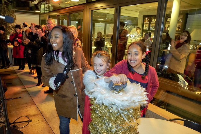 Angellica Bell with children at Christmas lights switch on in Dickens Yard, Ealing