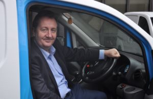 Councillor Julian Bell in one of the council's electric powered vans