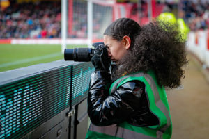 Young photographer Mia from Ealing at Brentford v Blackburn Rovers - Ealing Young Carers scheme