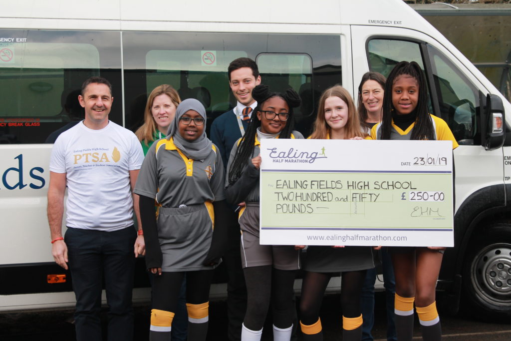 Ealing Fields High School get winning cheque from Ealing Half Marathon after winning its schools challenge