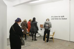 Gallery visitors at the time to talk installation