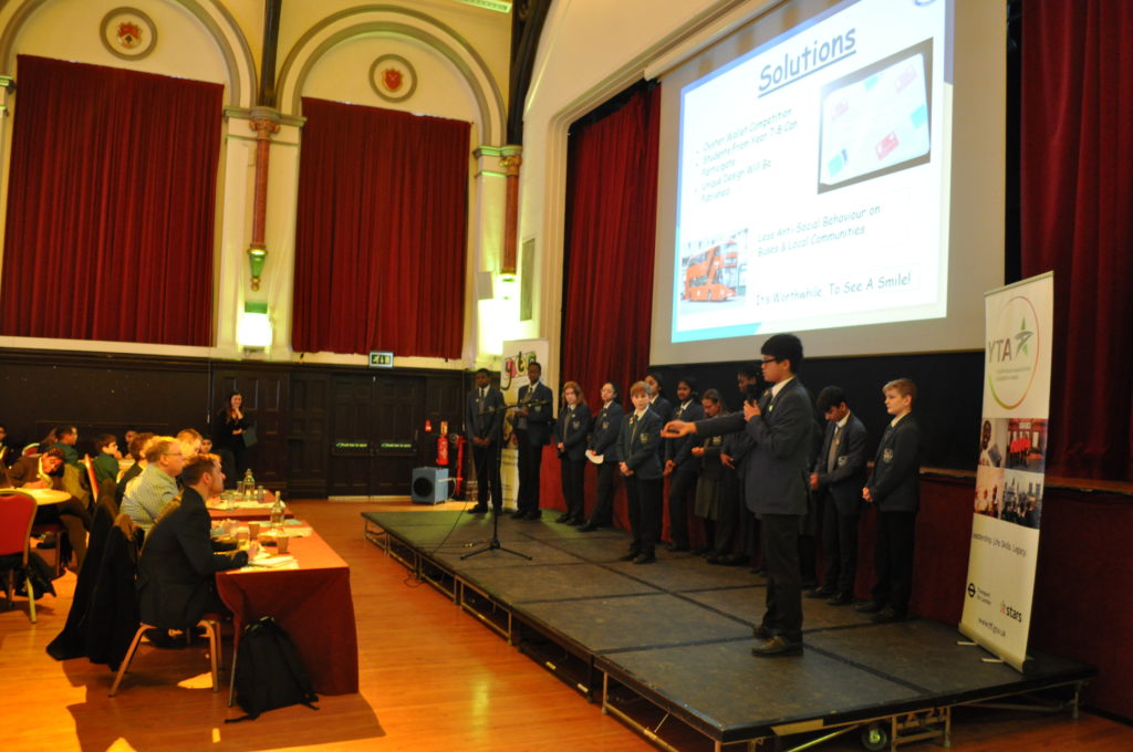 Youth travel ambassadors at The Cardinal Wiseman School giving a presentation of their project