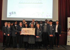 Youth travel ambassadors at The Cardinal Wiseman School with the winning cheque