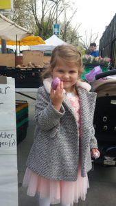 Swiss Cottage Easter Egg Treasure Hunt child with chocolate egg