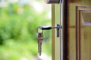 Close up on a front door with keys