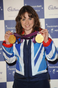 Natasha Baker, equestrian, with her gold medals at 2012 London Paralympics. Courtesy of Getty Images