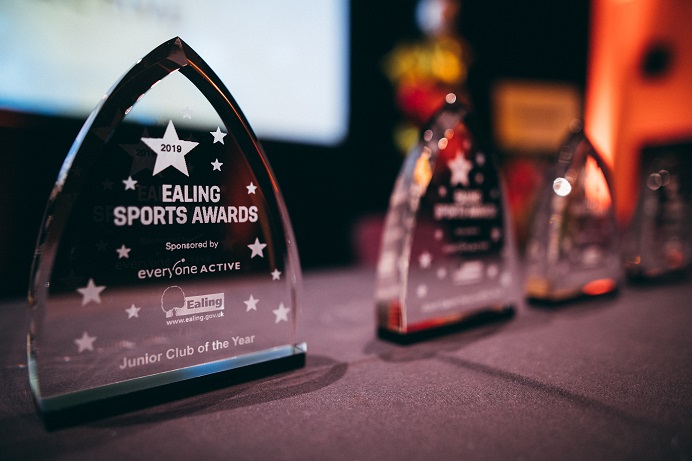 Ealing Sports Awards trophies displayed on a table