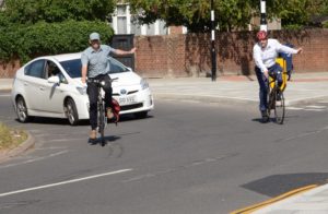 Councillor Julian Bell road testing the new round about