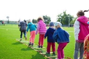 Young children getting active outdoors