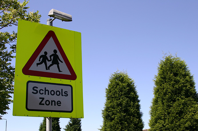 school travel safety sign