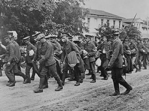 British servicemen being taken prisoner by German troops in the First World War