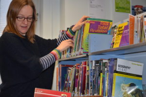Jenny Oldroyd, preparing for young readers at Northfields Community Library
