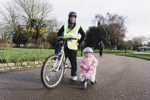 Cycling training - Iram Woolley and daughter in Southall Park