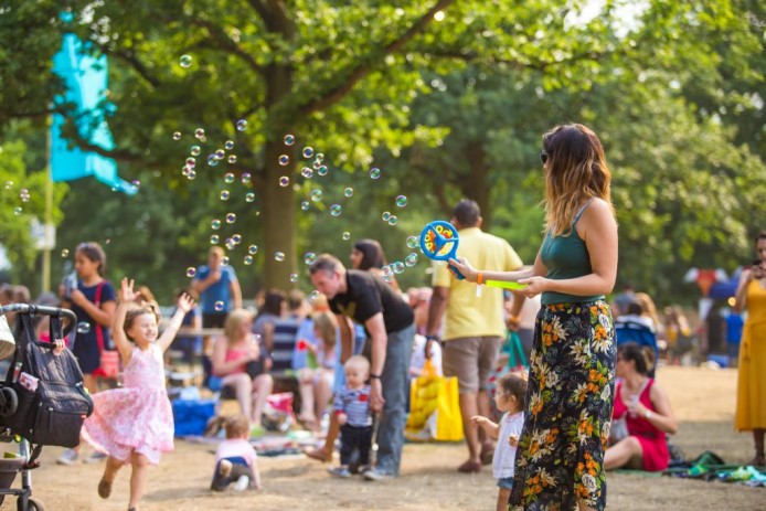 Families enjoying summer in the park