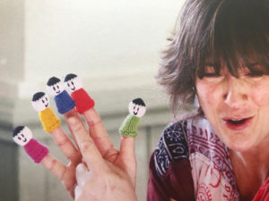 Lady with finger puppets