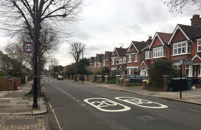 Residential road with 20 MPH speed limit road markings