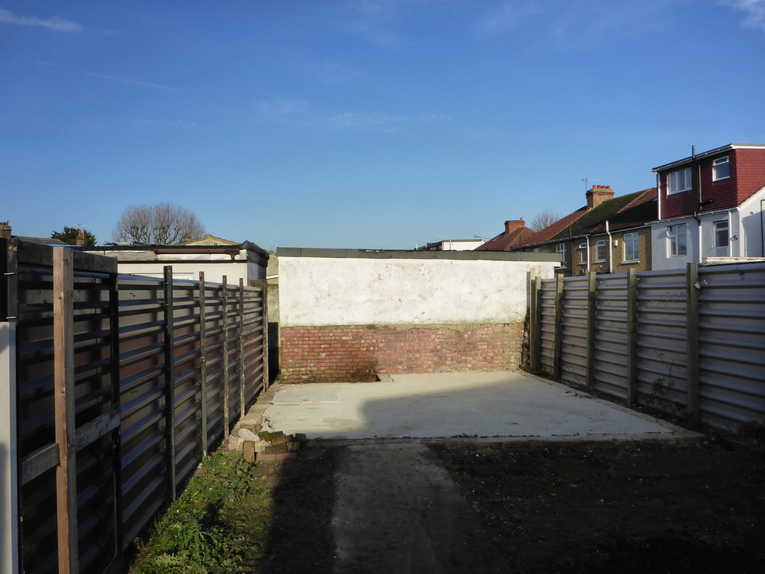 Cleared site after outbuilding demolished