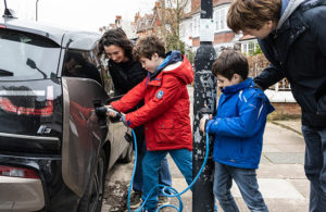 Bayliss family using their nearest simple socket electric car charging