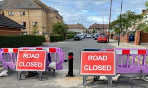 Road closed signs