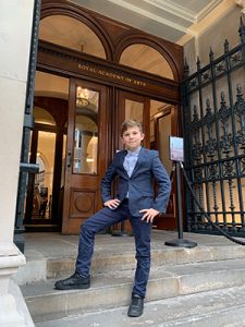 Edward Tabarac of Hanwell on the steps of the Royal Academy of Arts at the opening of its Young Artists Summer Show exhibition, which includes his painting of Pitzhanger Manor