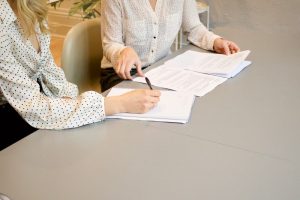 Two people consulting