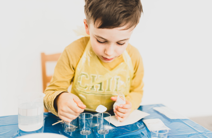 Boy doing science experiment