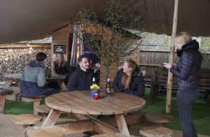 Customers return to the Plough pub, Norwood Green