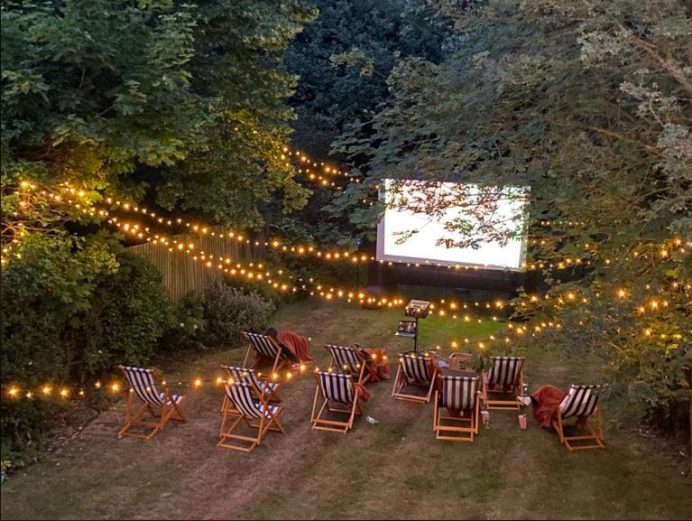 Outdoor cinema screen and chairs