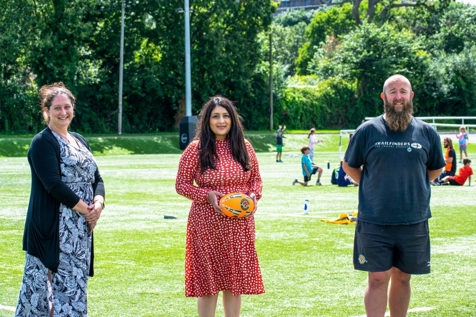 Members of the team providing the HAF activities for the summer holidays standing at Ealing Trailfinders rugby club