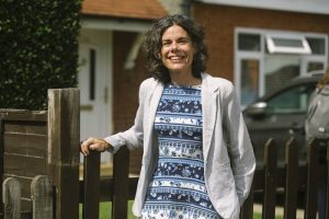 Councillor Deirdre Costigan standing outside a house