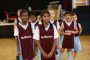 Children ready to take part in a PE lesson