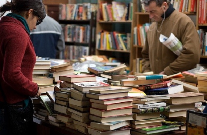People browsing books in a library