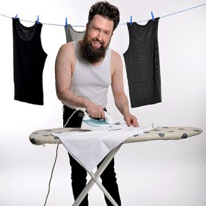 Comedian Andy Storey ironing vests